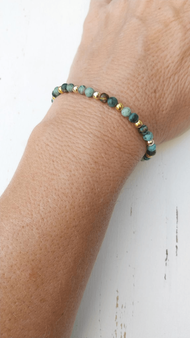 Bracelet en Turquoise Africaine et acier inoxydable plaqué or 