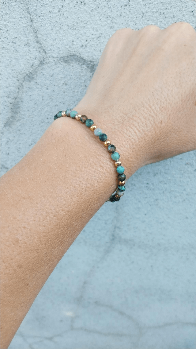 Bracelet en Turquoise Africaine et acier inoxydable plaqué or 