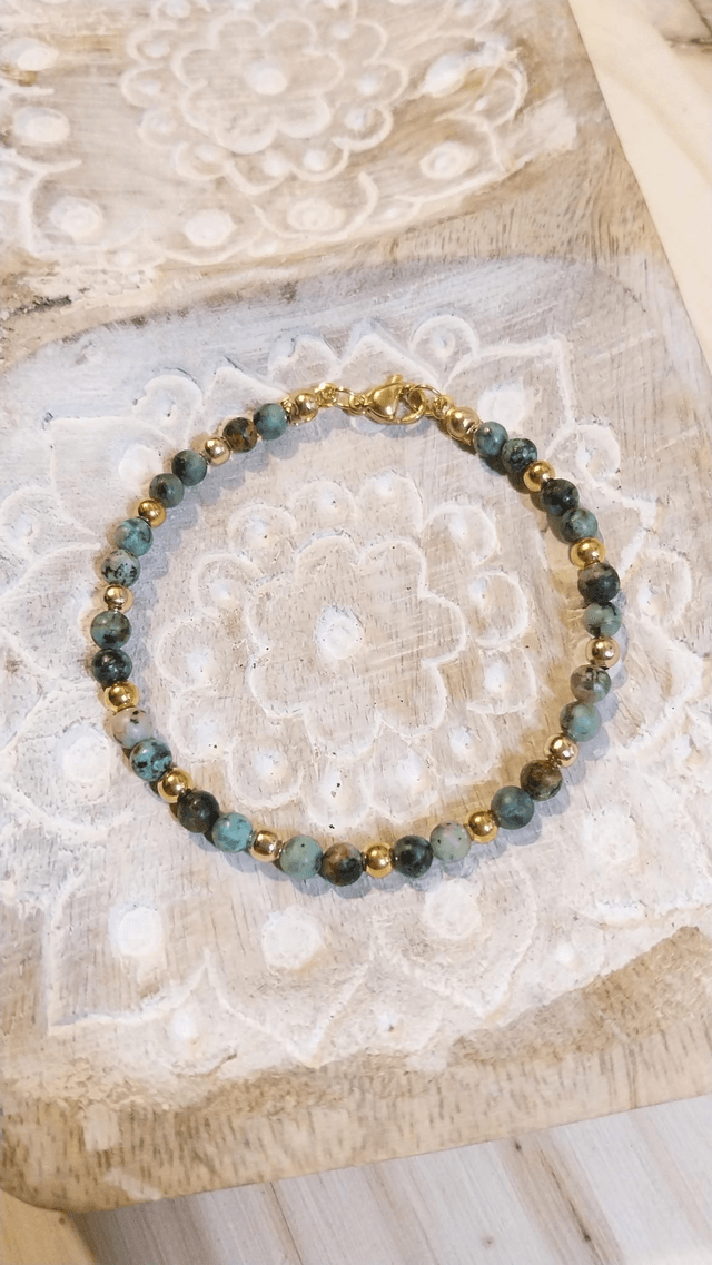 Bracelet en Turquoise Africaine et acier inoxydable plaqué or 